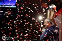 Darts - 2013 Ladbrokes World Darts Championship - Alexandra Palace, London - 1/1/13 Phil Taylor celebrates with the Sid Waddell Trophy after winning in the final Mandatory Credit: Action Images / Steven Paston Livepic