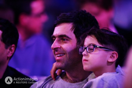 Darts - 2014 Ladbrokes World Darts Championship - Alexandra Palace, London - 01/01/14 Snooker player Ronnie O'Sullivan and his son watch during the final Mandatory Credit: Action Images / Steven Paston Livepic EDITORIAL USE ONLY.