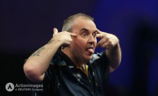 Darts - William Hill World Darts Championship - Alexandra Palace, London - 2/1/15 Phil Taylor reacting after winning a set during the Quarter Final Mandatory Credit: Action Images / Steven Paston Livepic EDITORIAL USE ONLY.
