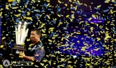 Darts - William Hill World Darts Championship - Alexandra Palace, London - 4/1/15 Gary Anderson celebrates with the Sid Waddell trophy after winning the World Darts Championship Mandatory Credit: Action Images / Steven Paston Livepic EDITORIAL USE ONLY.