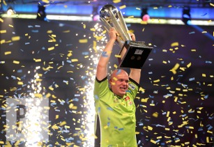 Michael van Gerwen celebrates winning with Sid Waddell trophy during day fifteen of the William Hill World Darts Championship at Alexandra Palace, London. PRESS ASSOCIATION Photo. Picture date: Monday January 2, 2017. See PA story DARTS World. Photo credit should read: Steven Paston/PA Wire. RESTRICTIONS: Use subject to restrictions. Editorial use only. No commercial use. Call +44 (0)1158 447447 for further information.