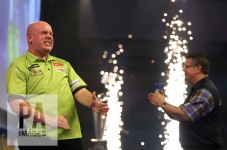 Michael van Gerwen celebrates winning against Gary Anderson during day fifteen of the William Hill World Darts Championship at Alexandra Palace, London. PRESS ASSOCIATION Photo. Picture date: Monday January 2, 2017. See PA story DARTS World. Photo credit should read: Steven Paston/PA Wire. RESTRICTIONS: Use subject to restrictions. Editorial use only. No commercial use. Call +44 (0)1158 447447 for further information.