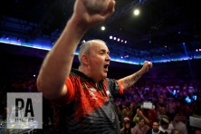 Phil Taylor reacting to the crowd after losing in the final as retires during day fifteen of the William Hill World Darts Championship at Alexandra Palace, London. PRESS ASSOCIATION Photo. Picture date: Monday January 1, 2018. See PA story DARTS World. Photo credit should read: Steven Paston/PA Wire. RESTRICTIONS: Use subject to restrictions. Editorial use only. No commercial use.