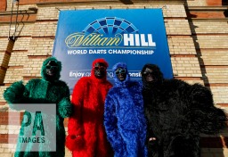 Fans in fancy dress outside Alexandra Palace during day ten of the William Hill PDC World Championship at Alexandra Palace, London. PRESS ASSOCIATION Photo. Picture date: Monday December 28, 2015. See PA story DARTS World. Photo credit should read: Steve Paston/PA Wire. Use subject to restrictions. Editorial use only. No commercial use. Call +44 (0)1158 447447 for further information.
