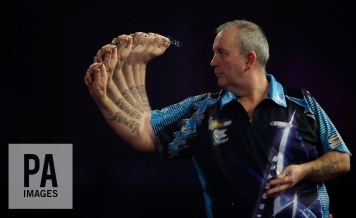 Phil Taylor (Editor note taken using in camera multiple exposure affect) in action during the 1st round match during day three of the William Hill PDC World Championship at Alexandra Palace, London. PRESS ASSOCIATION Photo. Picture date: Saturday December 19, 2015. See PA story DARTS World. Photo credit should read: Steve Paston/PA Wire. Use subject to restrictions. Editorial use only. No commercial use. Call +44 (0)1158 447447 for further information.